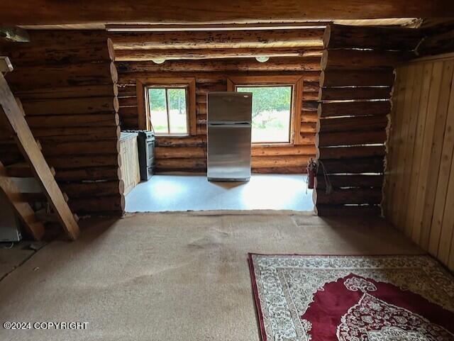 unfinished attic with a healthy amount of sunlight