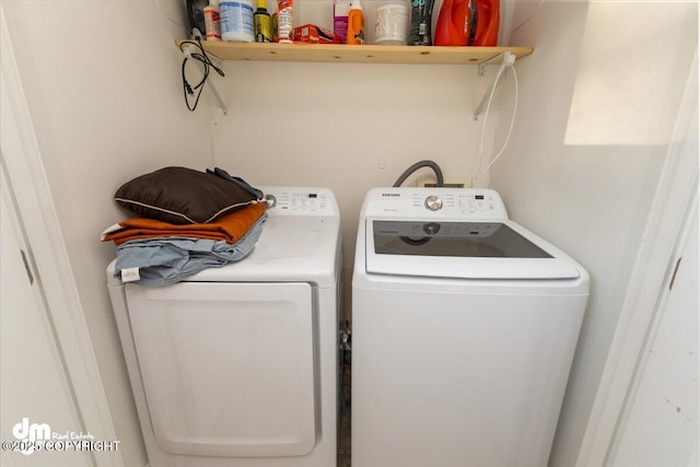 washroom featuring independent washer and dryer