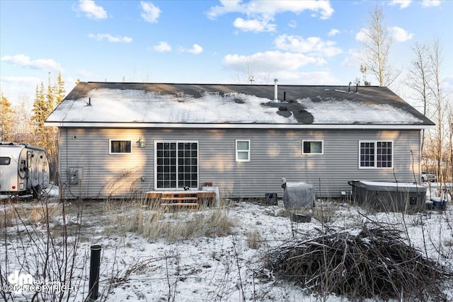 view of snow covered property