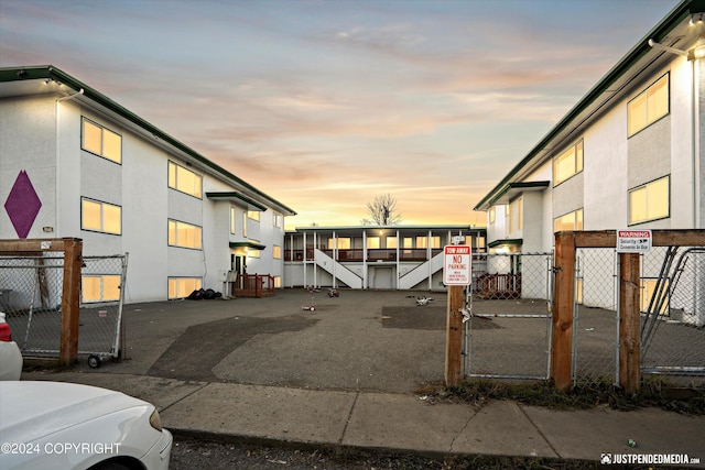 exterior space featuring a gate and fence