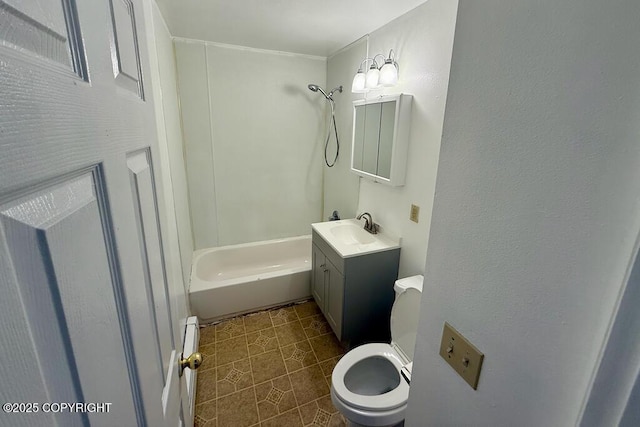 bathroom with tile patterned floors, toilet, vanity, and  shower combination