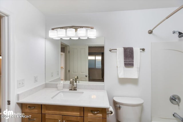 full bathroom with vanity, shower / washtub combination, and toilet