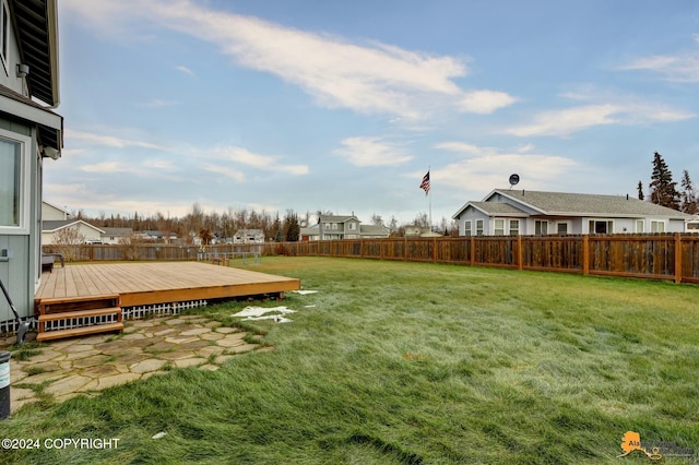 view of yard featuring a wooden deck