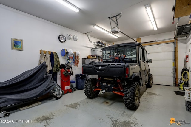 garage featuring a garage door opener