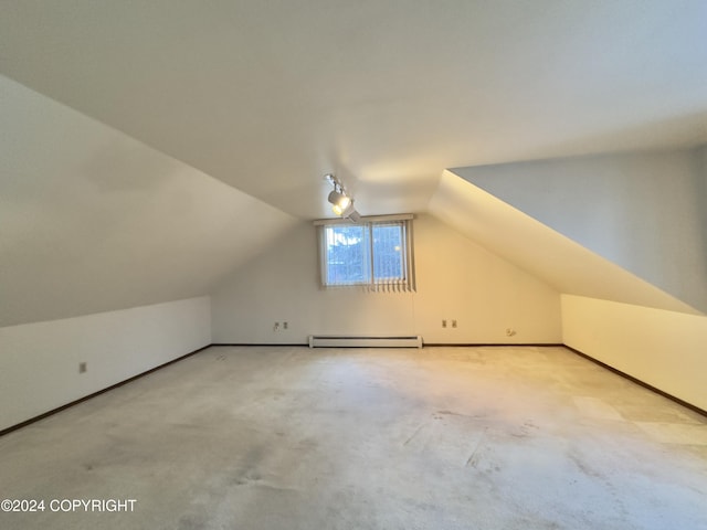 bonus room featuring baseboard heating, light carpet, and lofted ceiling