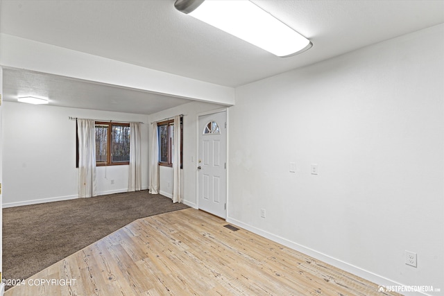 unfurnished room featuring wood-type flooring