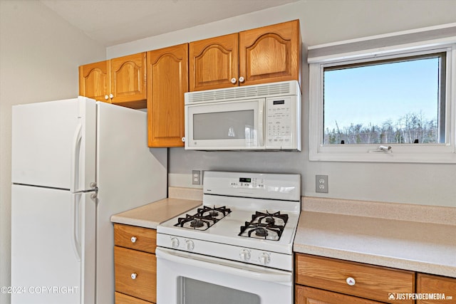 kitchen featuring white appliances