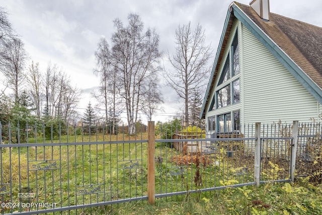 4480 E 138th Ave, Anchorage, AK 99516 - view of home's exterior featuring roof with shingles