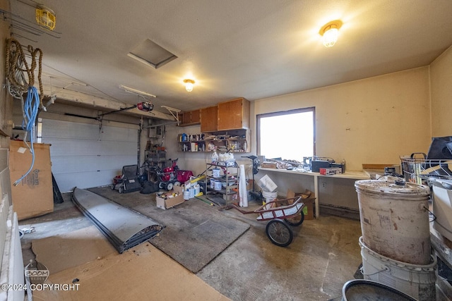 4480 E 138th Ave, Anchorage, AK 99516 - garage featuring a garage door opener
