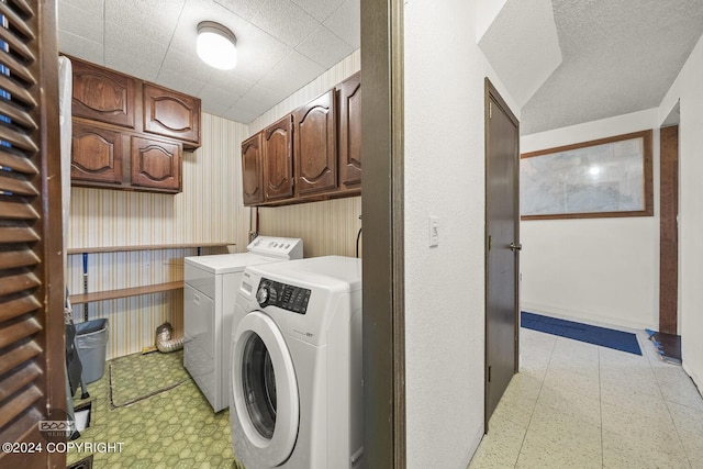 4480 E 138th Ave, Anchorage, AK 99516 - washroom featuring light flooring, washing machine and clothes dryer, cabinet space, and baseboards