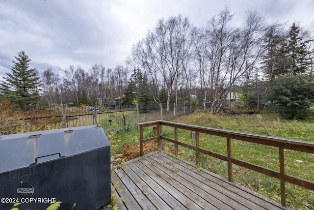 4480 E 138th Ave, Anchorage, AK 99516 - wooden terrace featuring a fenced backyard and view of scattered trees