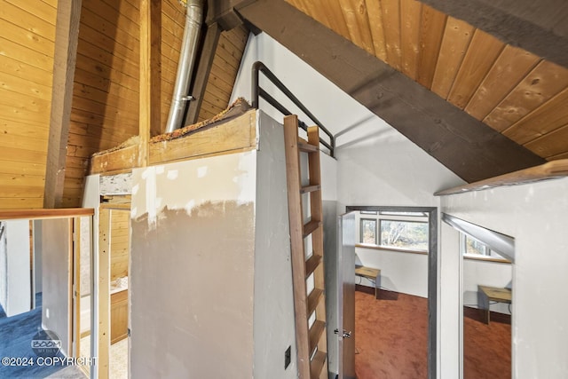 4480 E 138th Ave, Anchorage, AK 99516 - detailed view of wooden ceiling with exposed beams, carpet flooring, and wooden walls