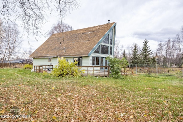 4480 E 138th Ave, Anchorage, AK 99516 - back of property with a wooden deck and a shingled roof