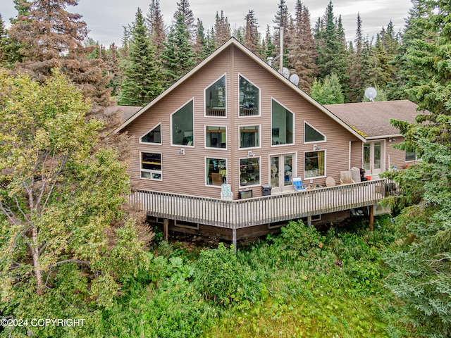 rear view of property with a deck