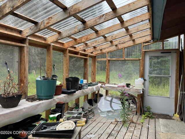 sunroom featuring outdoor dry bar