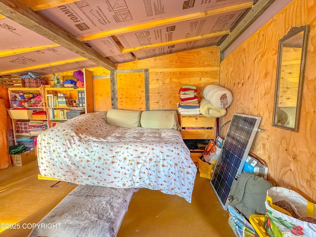 17597 Arcturus Loop, Ninilchik, AK 99639 - bedroom featuring wood walls and concrete flooring