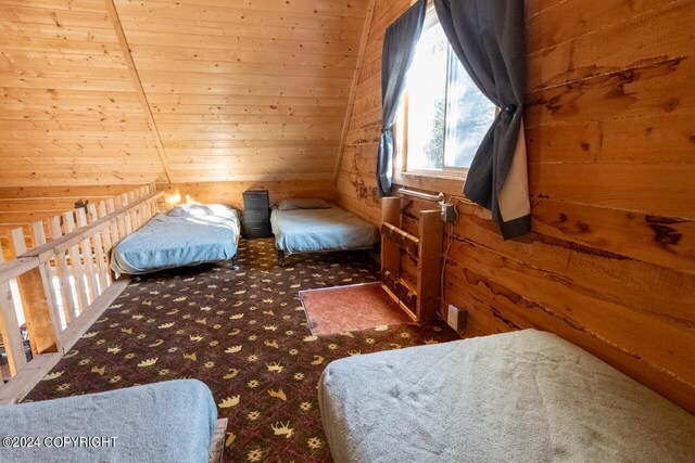 65449 Lingonberry Rd, Ninilchik, AK 99639 - carpeted bedroom featuring wooden walls