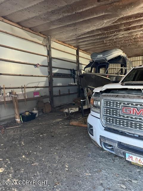 garage with a carport