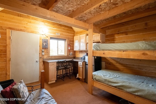 carpeted bedroom featuring wood walls and beamed ceiling