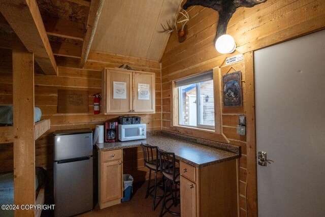 65449 Lingonberry Rd, Ninilchik, AK 99639 - home office featuring lofted ceiling and wood walls