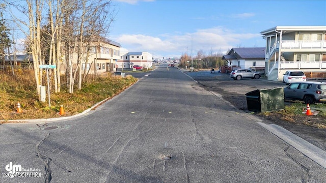 view of road with a residential view