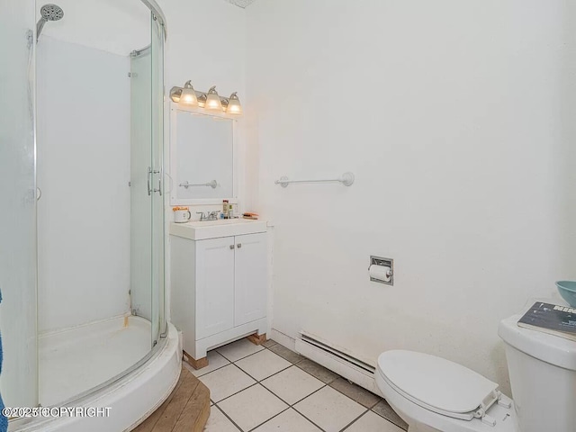 full bath with vanity, baseboard heating, tile patterned floors, toilet, and a shower stall