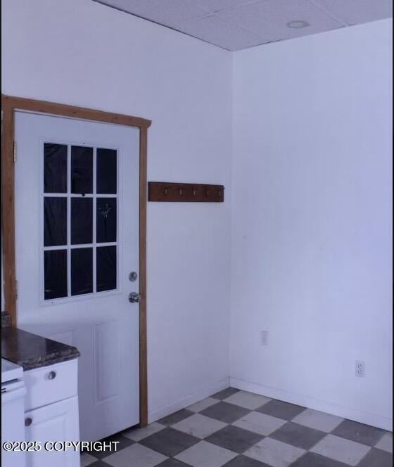 doorway to outside featuring dark floors
