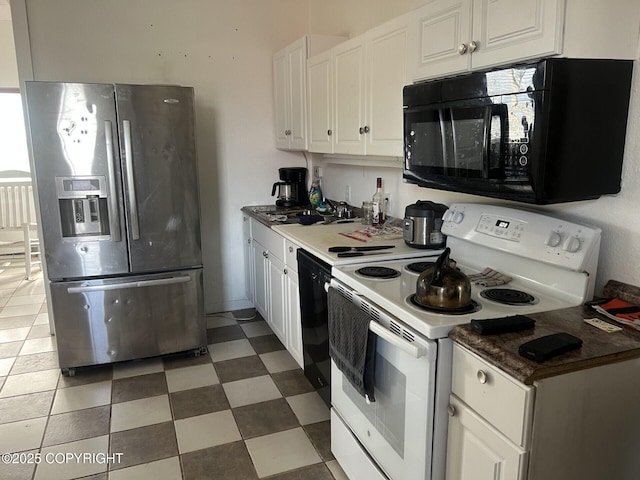 kitchen with white cabinets, tile patterned floors, and black appliances