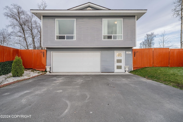 view of front of property with a garage