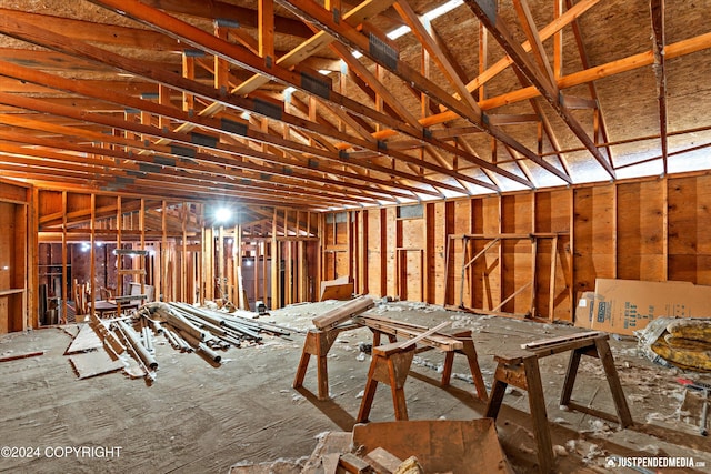 miscellaneous room featuring lofted ceiling