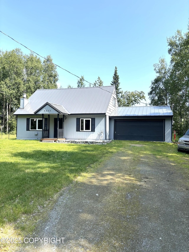 7025 S Gilleys Cir, Wasilla, AK 99654 - single story home featuring dirt driveway, a front lawn, a garage, and a metal roof