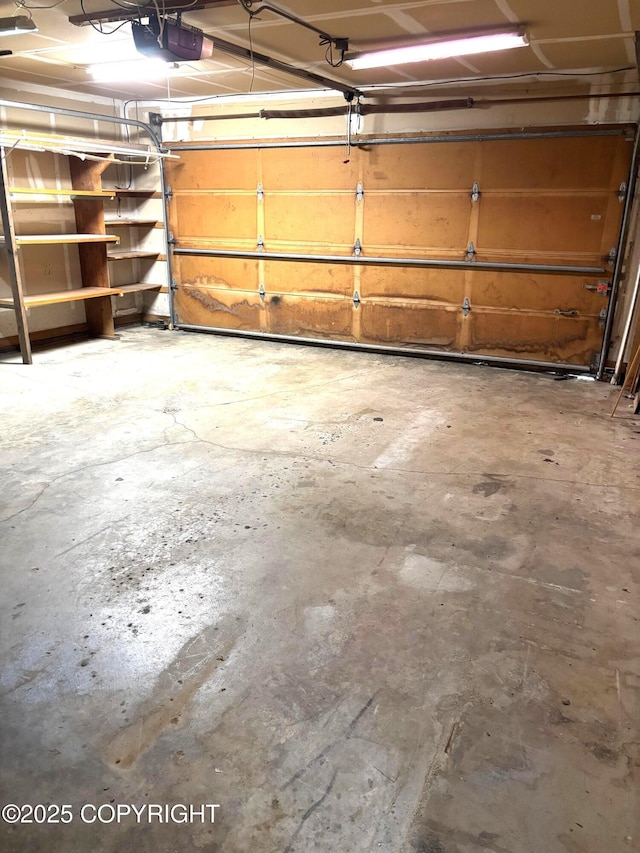 7025 S Gilleys Cir, Wasilla, AK 99654 - garage featuring a garage door opener