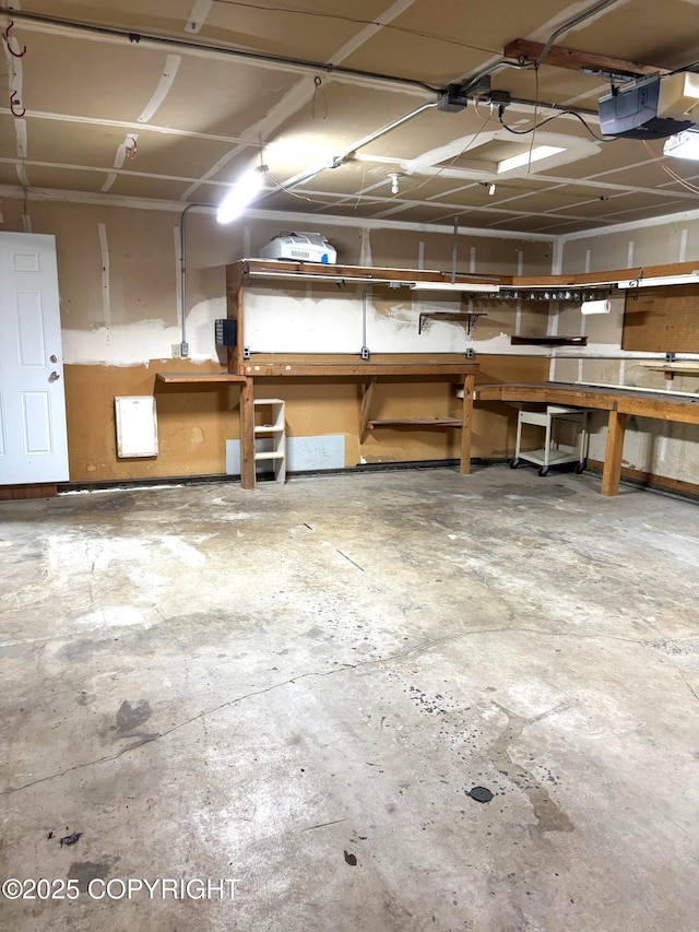 7025 S Gilleys Cir, Wasilla, AK 99654 - garage featuring a garage door opener