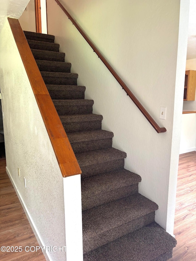 7025 S Gilleys Cir, Wasilla, AK 99654 - stairs with wood finished floors