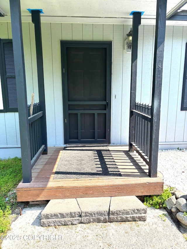 7025 S Gilleys Cir, Wasilla, AK 99654 - property entrance featuring covered porch