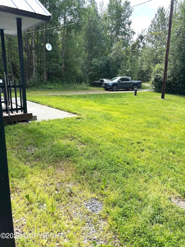 7025 S Gilleys Cir, Wasilla, AK 99654 - view of grassy yard