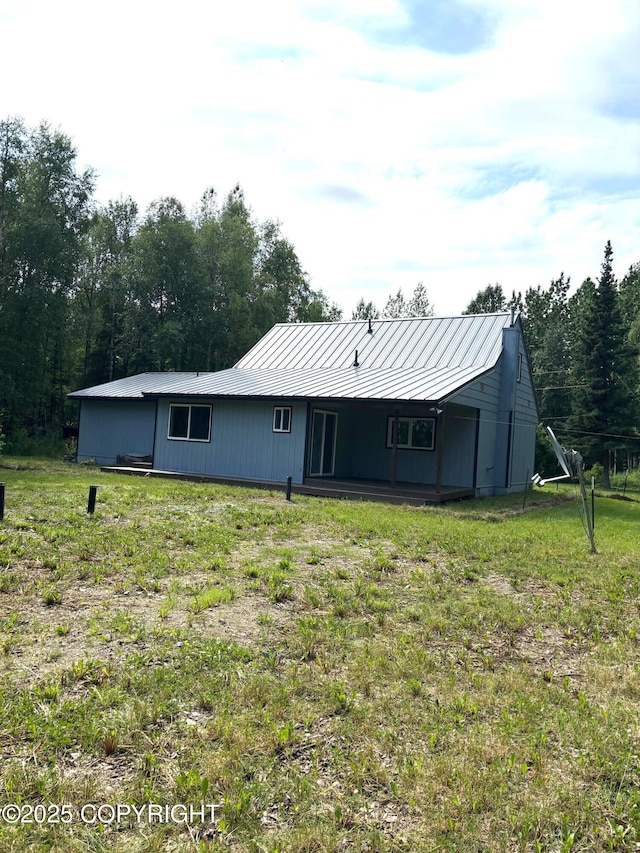 7025 S Gilleys Cir, Wasilla, AK 99654 - rear view of property with a standing seam roof and a metal roof