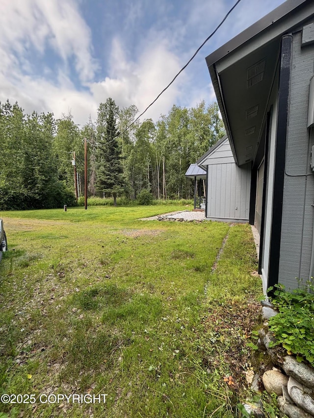7025 S Gilleys Cir, Wasilla, AK 99654 - view of green lawn