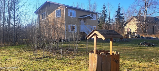 view of property exterior featuring a yard