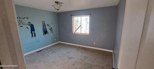 spare room with carpet flooring