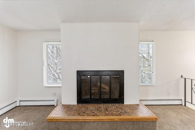 details with carpet, a baseboard heating unit, and a textured ceiling