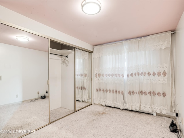 unfurnished bedroom featuring a closet