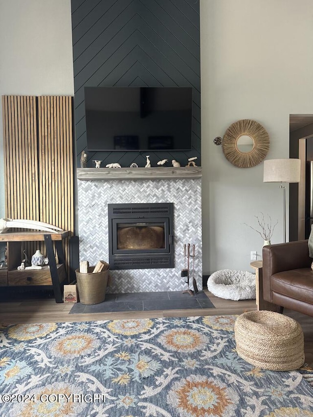 living room featuring a fireplace and hardwood / wood-style floors