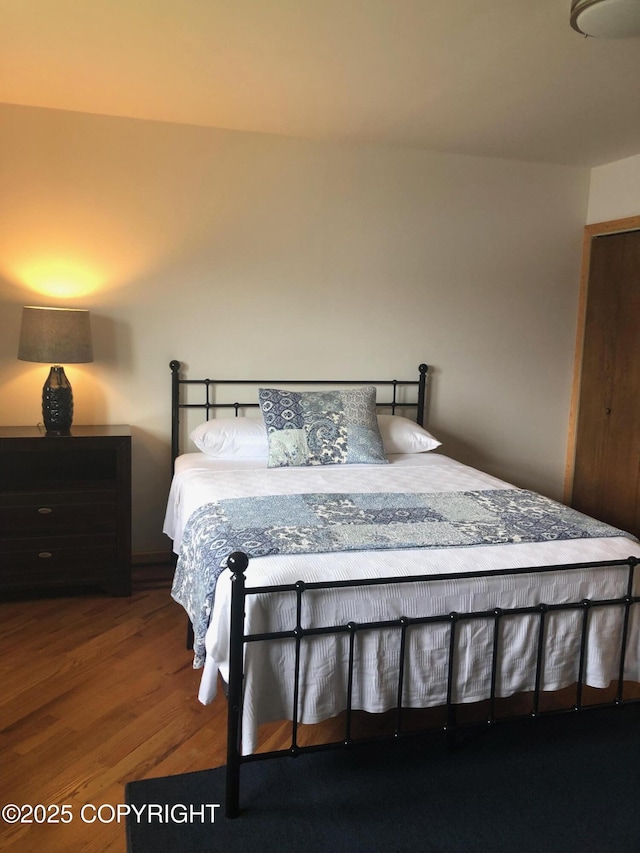 251 Main St, Seldovia, AK 99663 - bedroom featuring wood finished floors