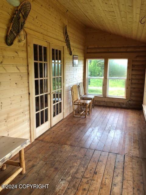 28160 Chestes St, Ninilchik, AK 99556 - sunroom / solarium featuring french doors and vaulted ceiling