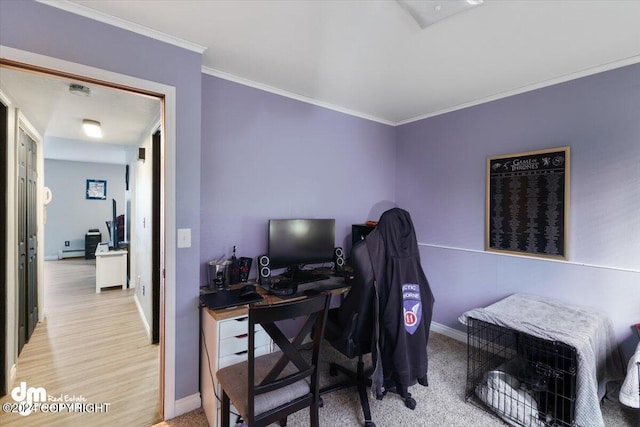 office area featuring ornamental molding, baseboard heating, and light colored carpet