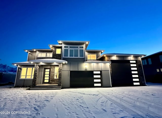 prairie-style home featuring a garage