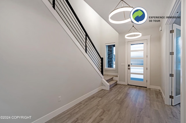 entrance foyer with light wood-type flooring