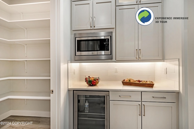 pantry featuring beverage cooler