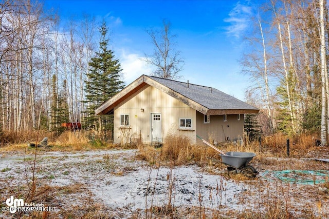 view of snow covered house